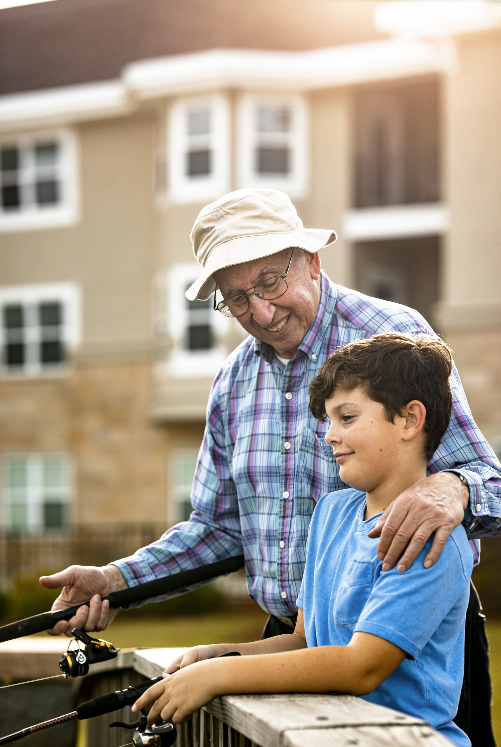 senior fishing with grandson