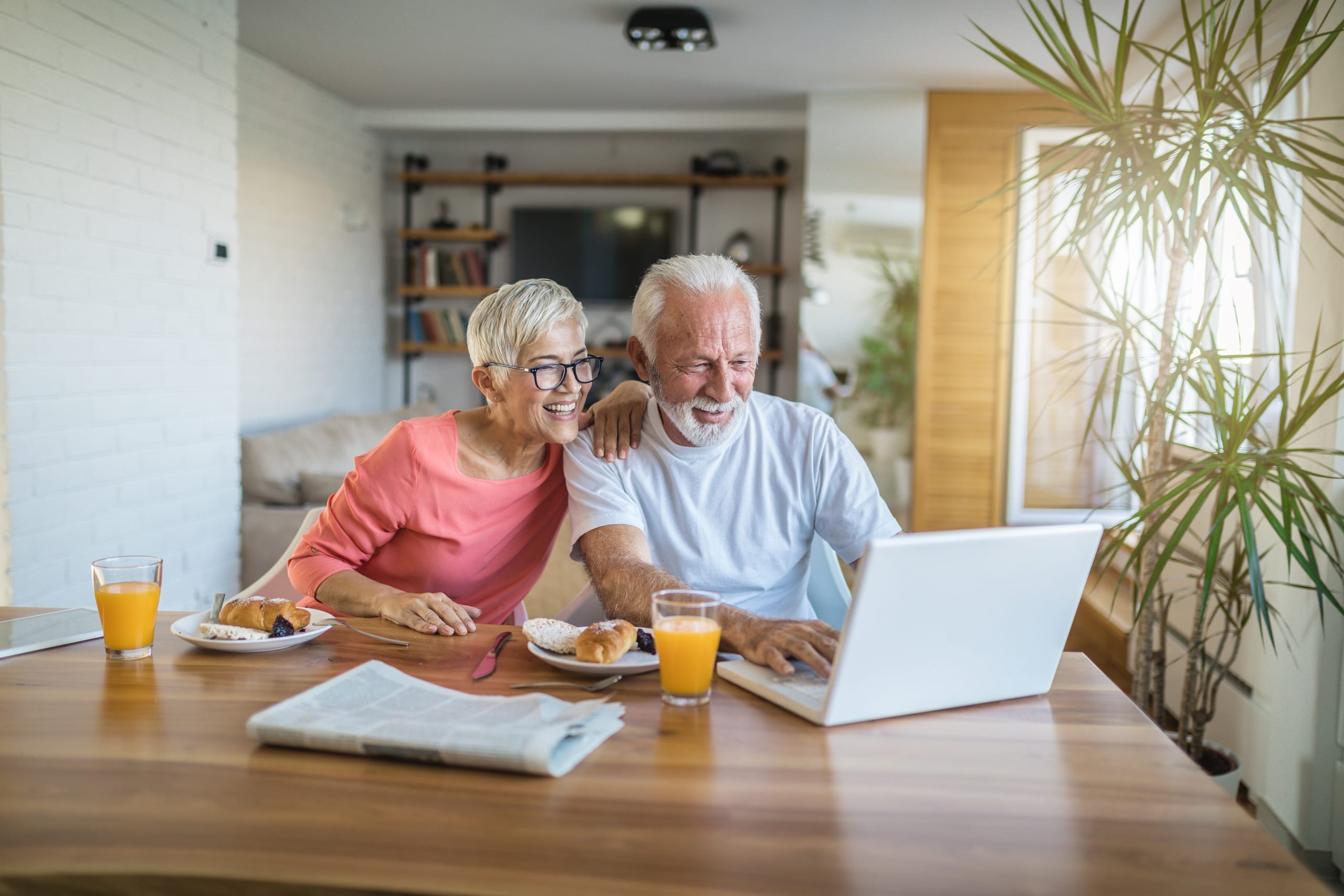 Senior couple shopping online