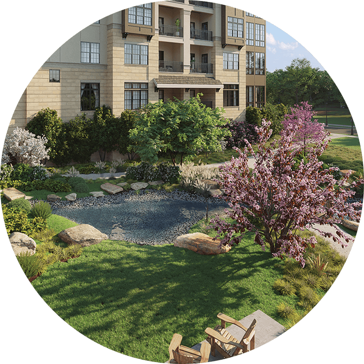 Exterior view of Searstone Retirement Community featuring lush greenery