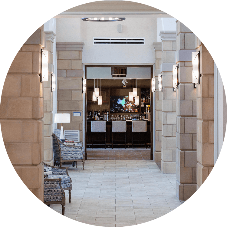 Senior living hallway leading up to a bar