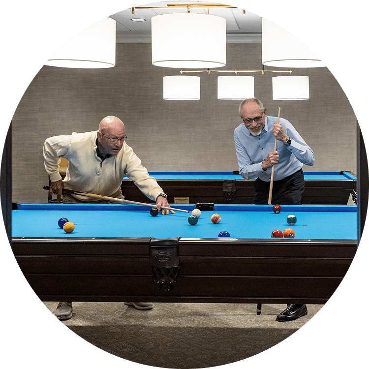 Senior men playing billiards at Searstone in North Carolina