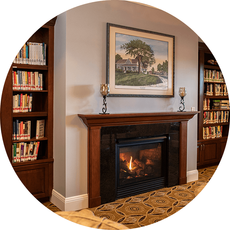 Fireplace and bookshelves located within Searstone