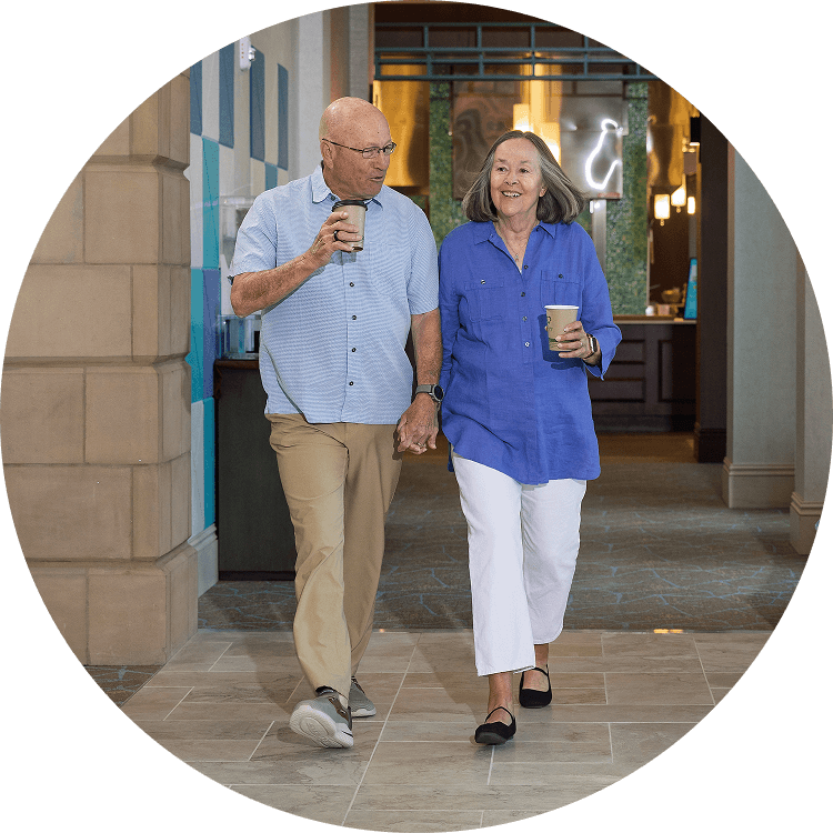 Senior couple enjoying their morning coffee at Searstone