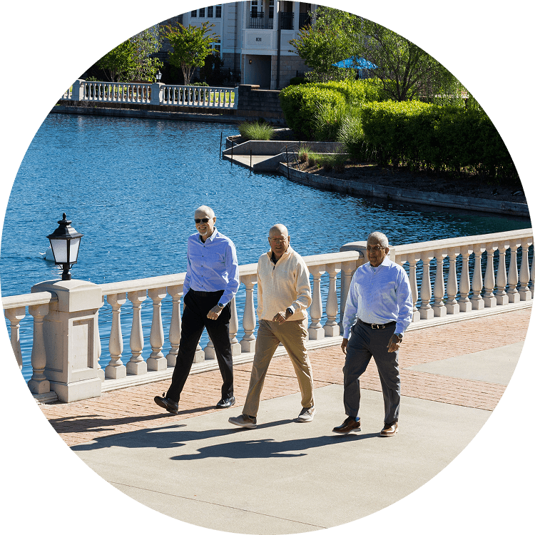Elderly men walking outside