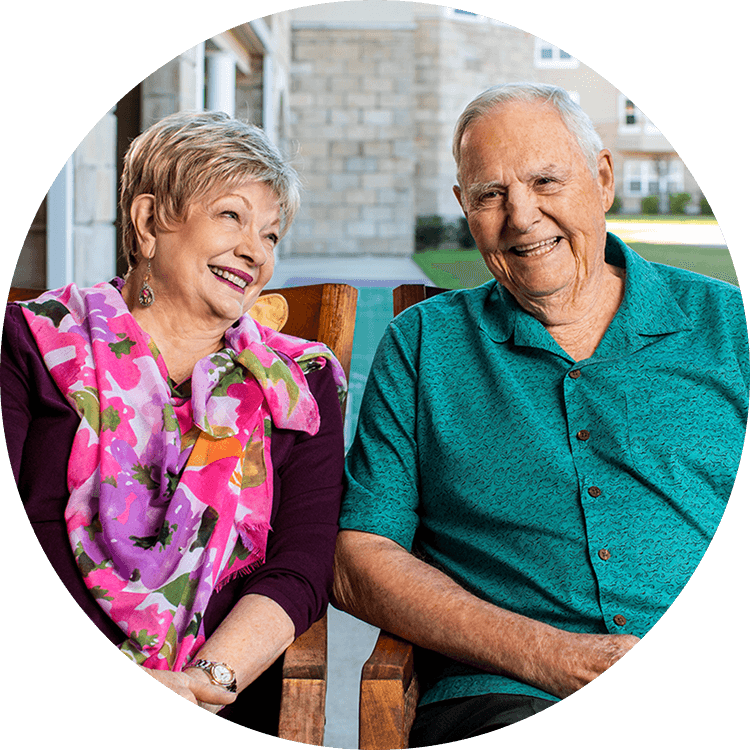 Senior couple seated for an interview
