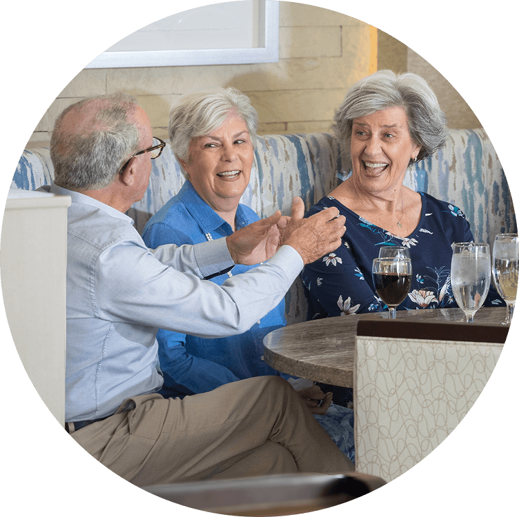 Seniors enjoying alcoholic beverages at Searstone